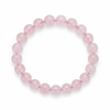Pink beaded bracelet on a white background