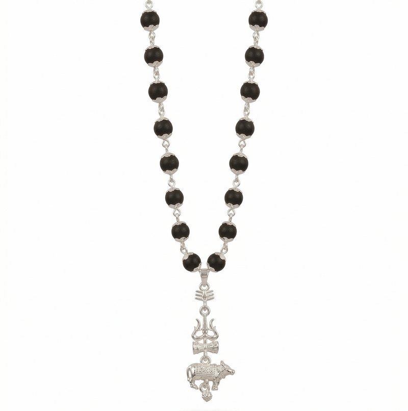 Black beaded necklace with a silver pendant on a white background