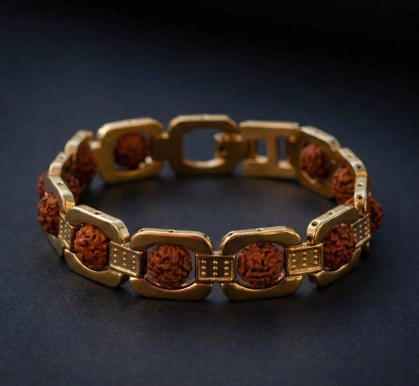 Gold bracelet with brown beads on a dark background